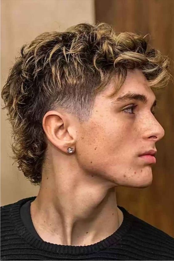 mens wavy hairstyle wavy modern mullet haircut