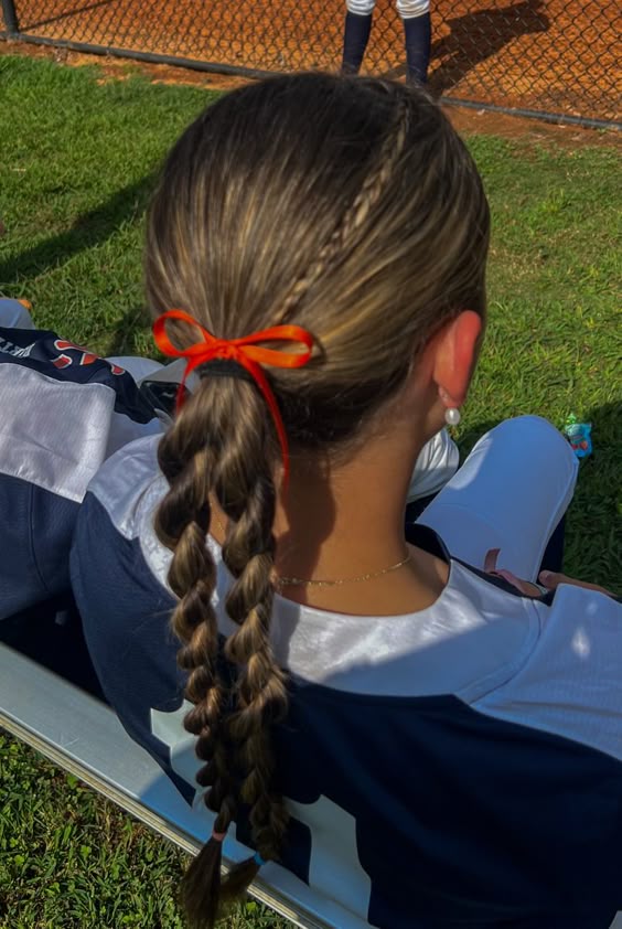  brown softball hairstyle 